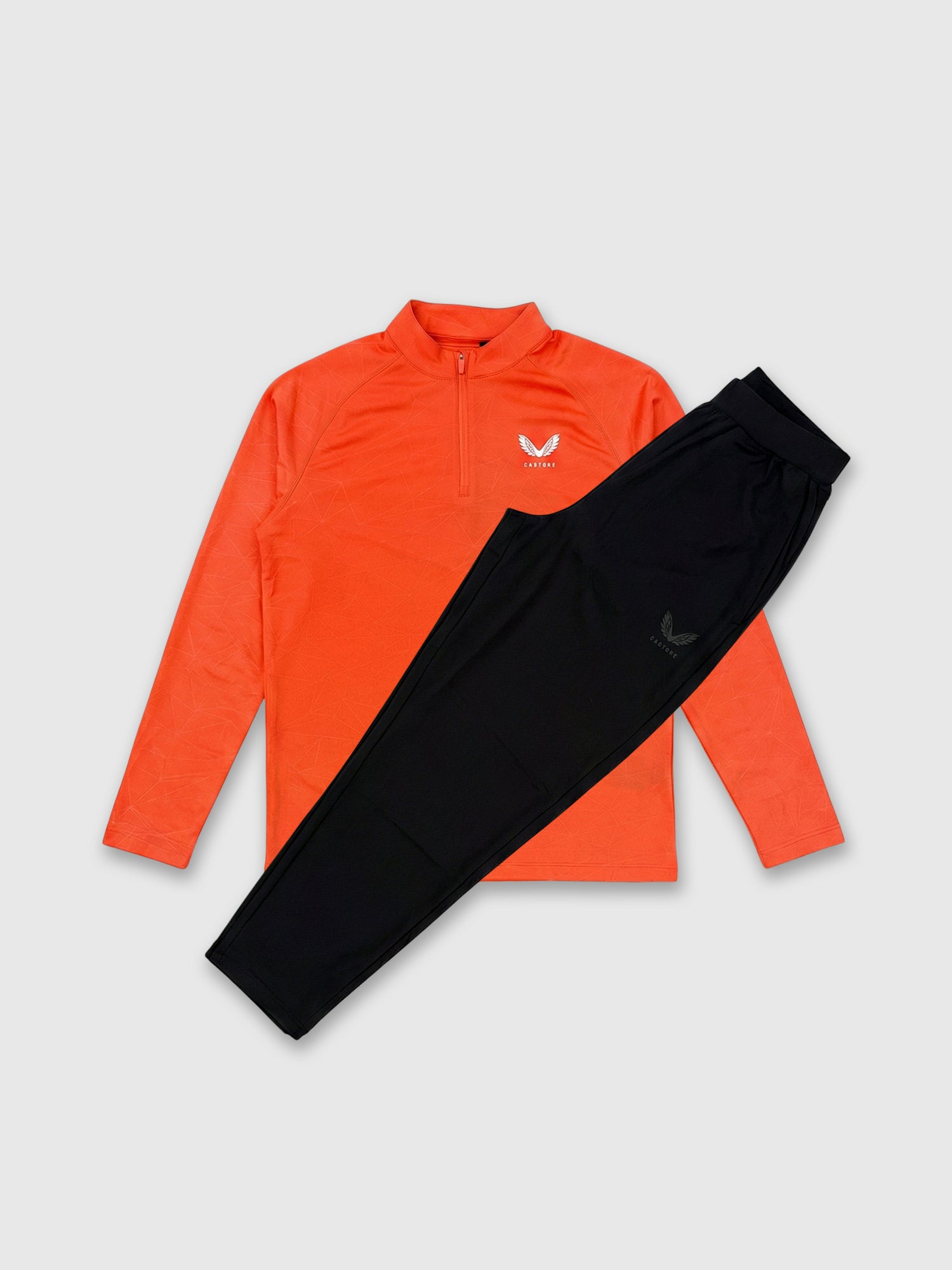 Castore Adapt Training Half Zip Top/Pant Set Bright Orange/Mid Grey/Black from Saxumo.com