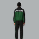 Lacoste Sport Printed Tracksuit in green and black, featuring a sleek design with a printed logo on the chest and matching track pants, perfect for athletic and casual wear.