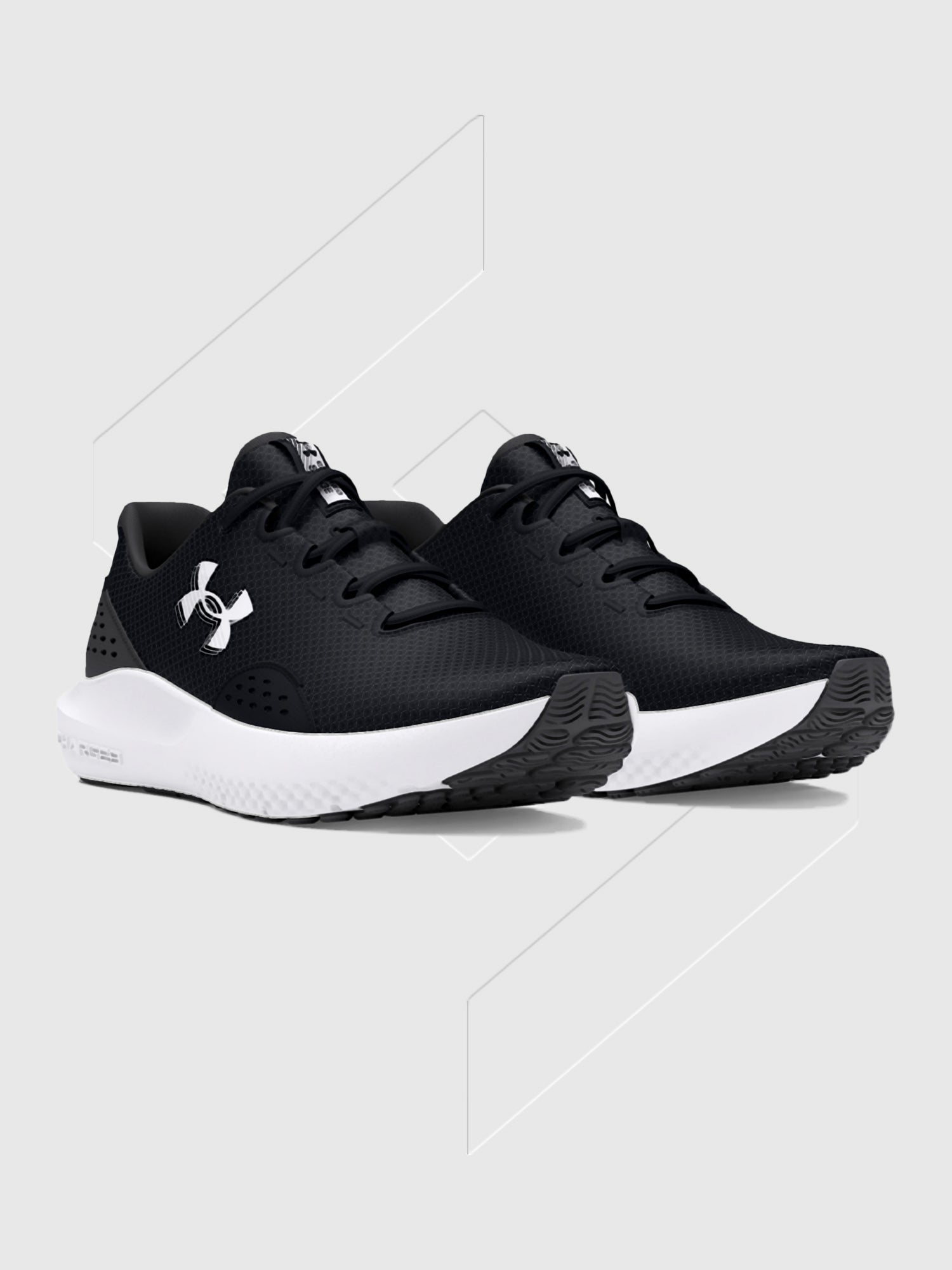 Under Armour Surge 4.0 Trainers Black/White from Saxumo