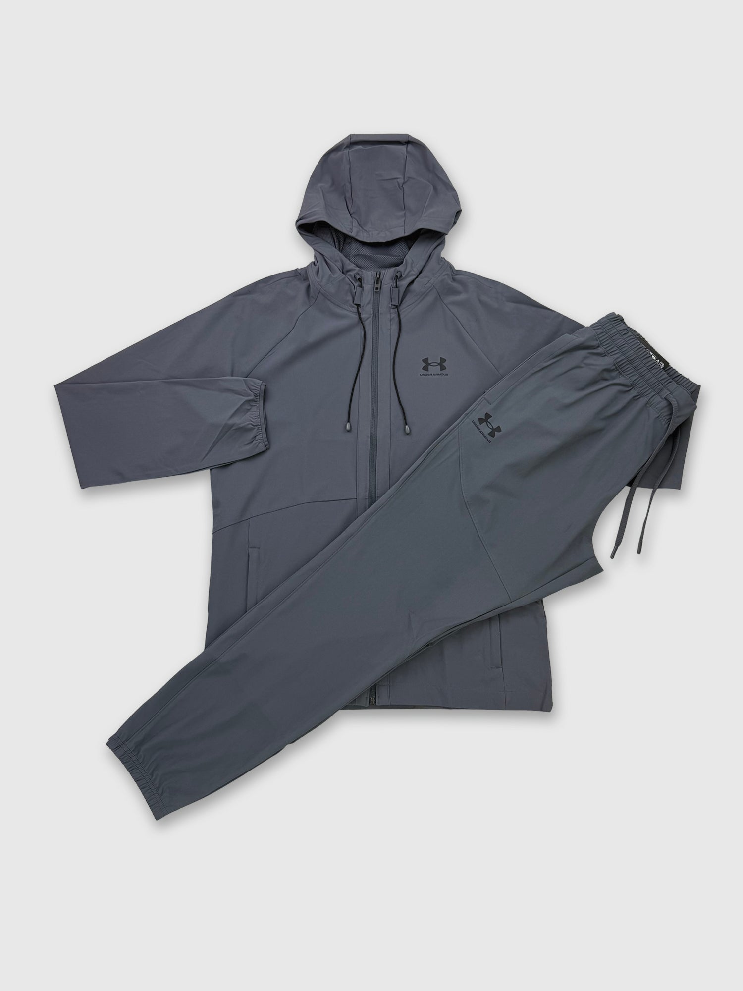 Under Armour Woven Jacket /Pant Set Castlerock/Black from Saxumo.com