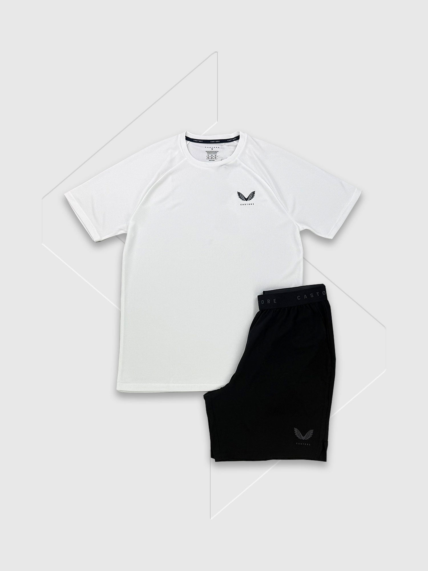 Castore Adapt Training Branded Elastic T-Shirt/Short Set White/Black from Saxumo.com